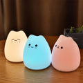 Veilleuse en silicone aux formes arrondies, sur base stable