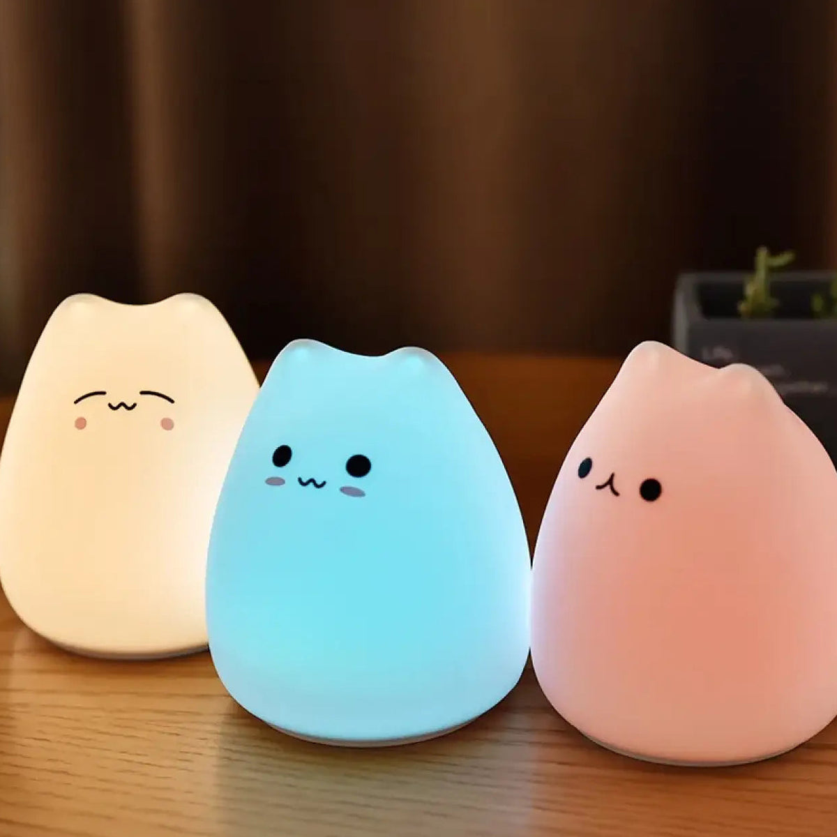 Veilleuse en silicone aux formes arrondies, sur base stable