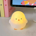 Veilleuse petit poussin aux formes arrondies